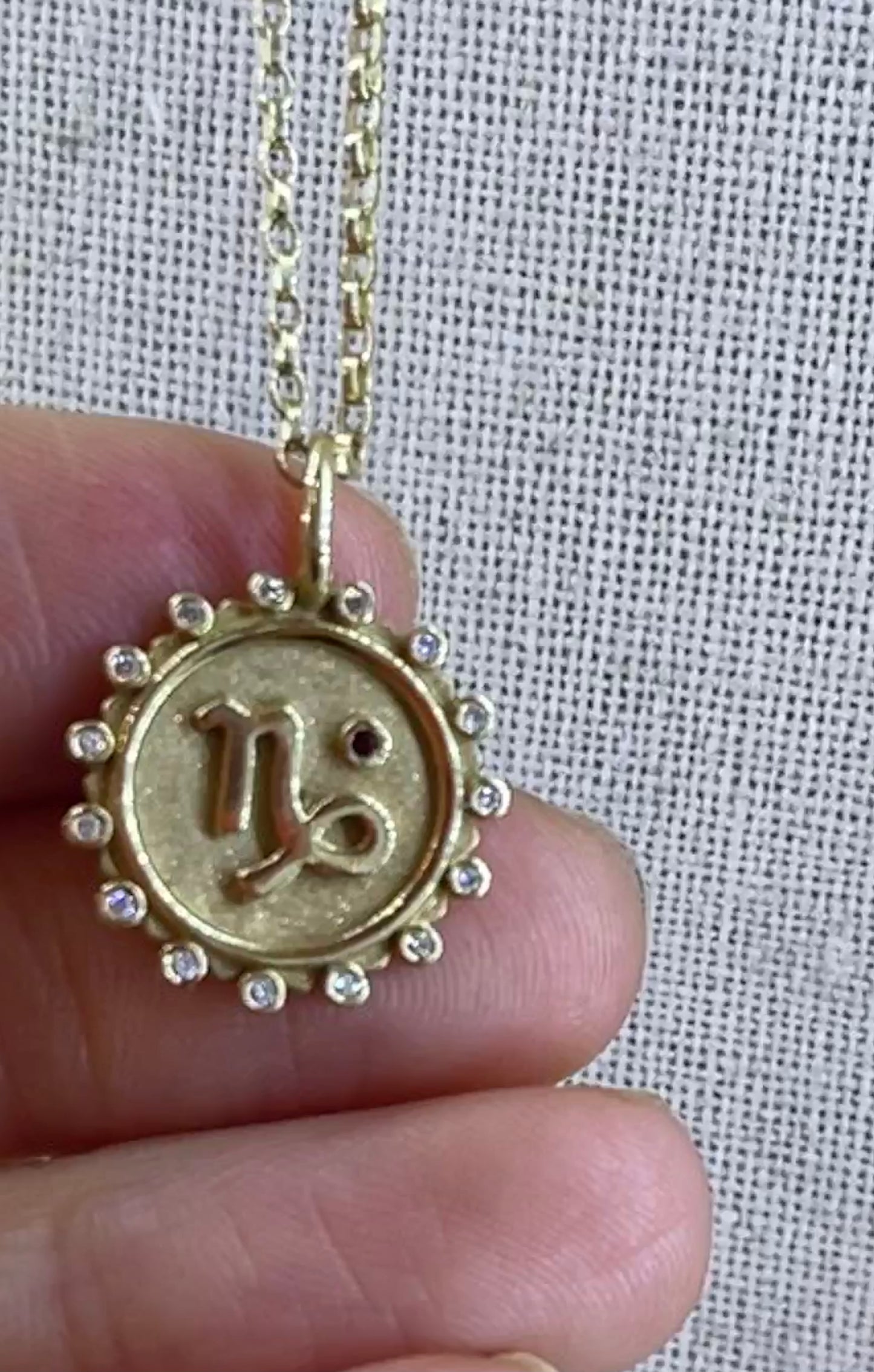 Zodiac Charm “Capricorn” diamonds around