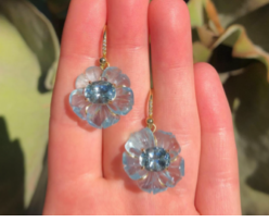 Tropical Flower One of a Kind 18k Yellow Gold Earrings set with Aquamarine Flower Carvings (19.97 cts) and Oval Faceted Aquamarine (3.63 cts) on a Diamond Pave Hook (0.03cts)